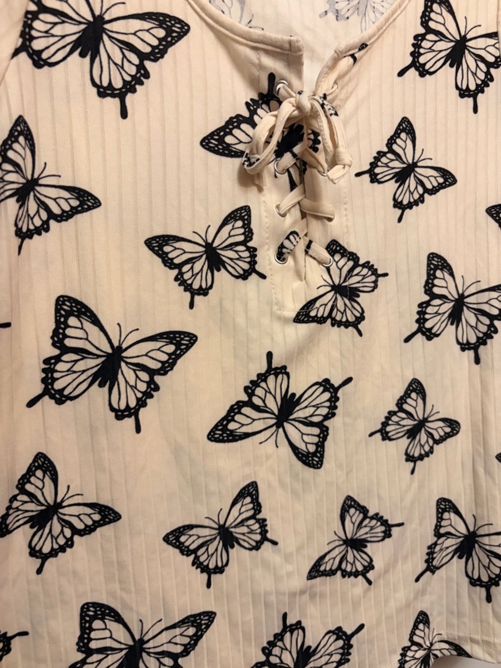 Women's Cream Lace-Up Short Sleeve Tee with Black Butterfly Print